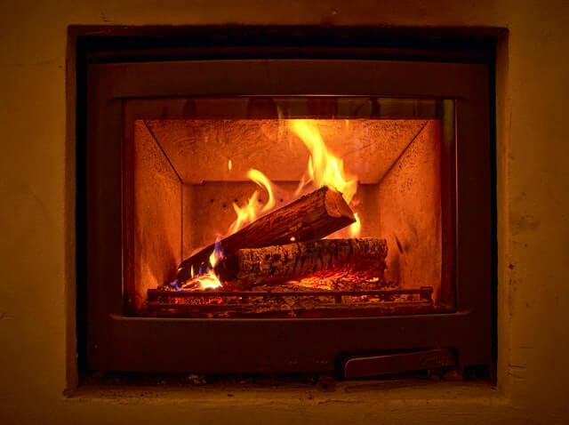 replacing a gas fireplace with a wood burning insert