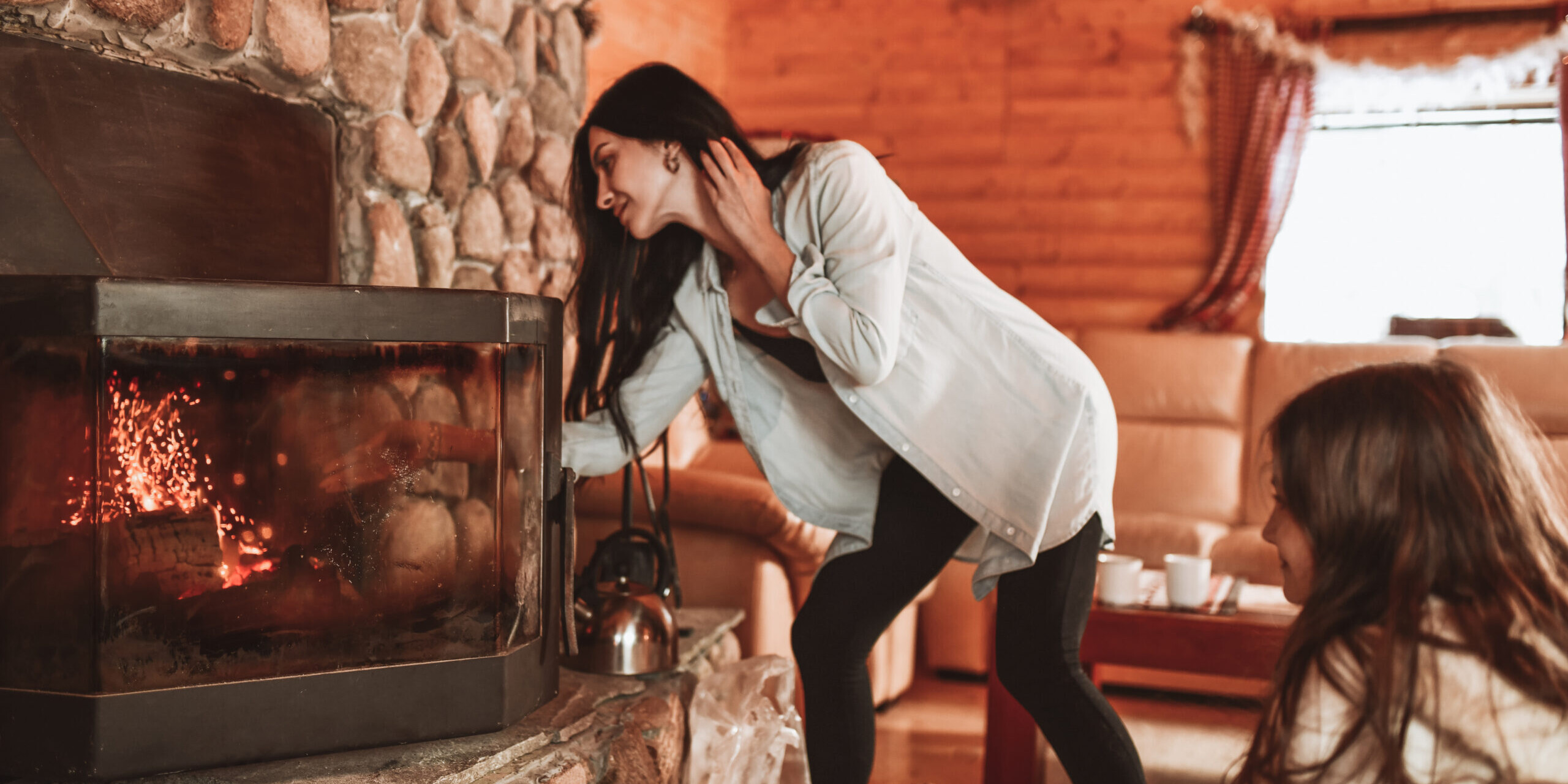 Lighting a fire in a fireplace