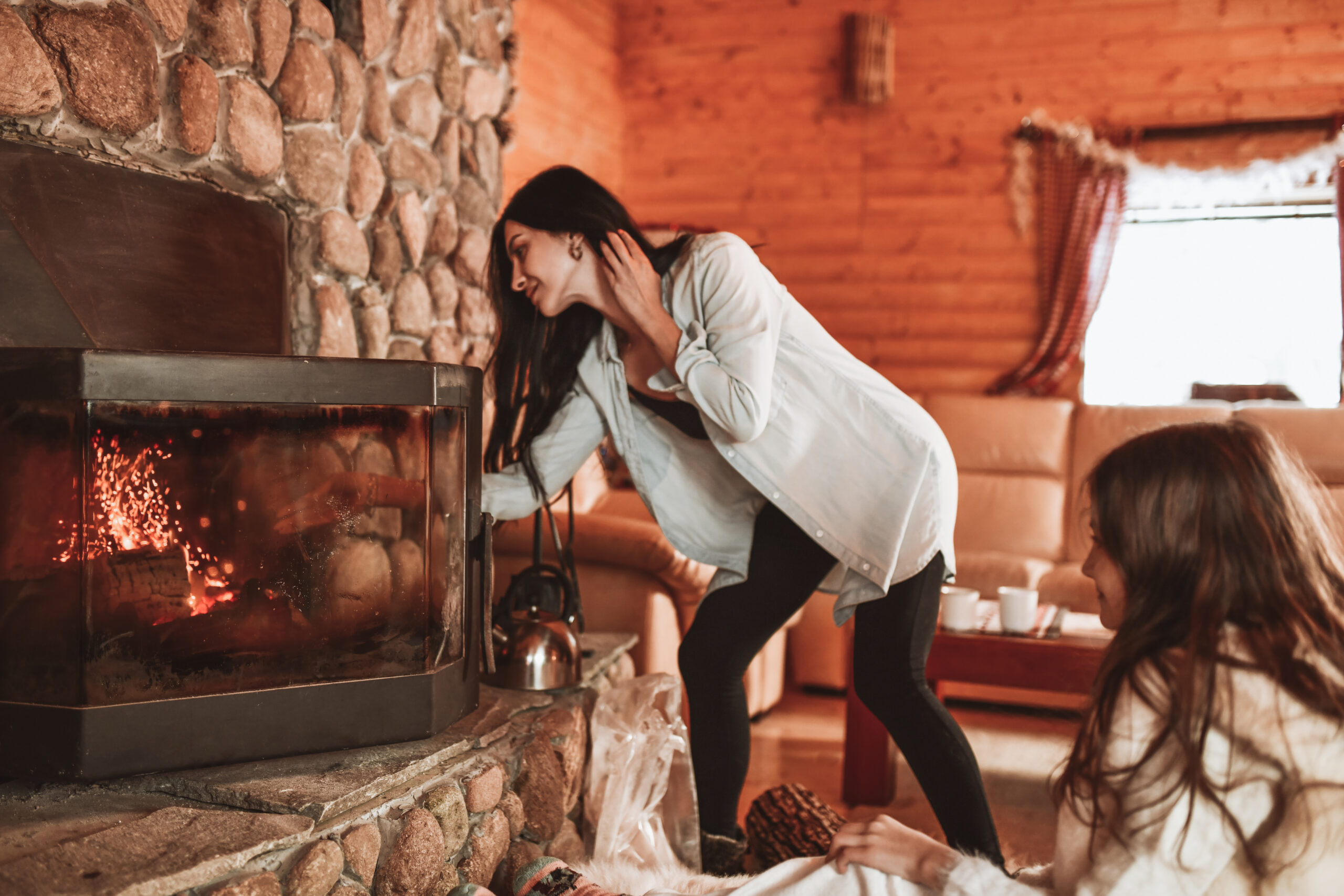 Lighting a fire in a fireplace